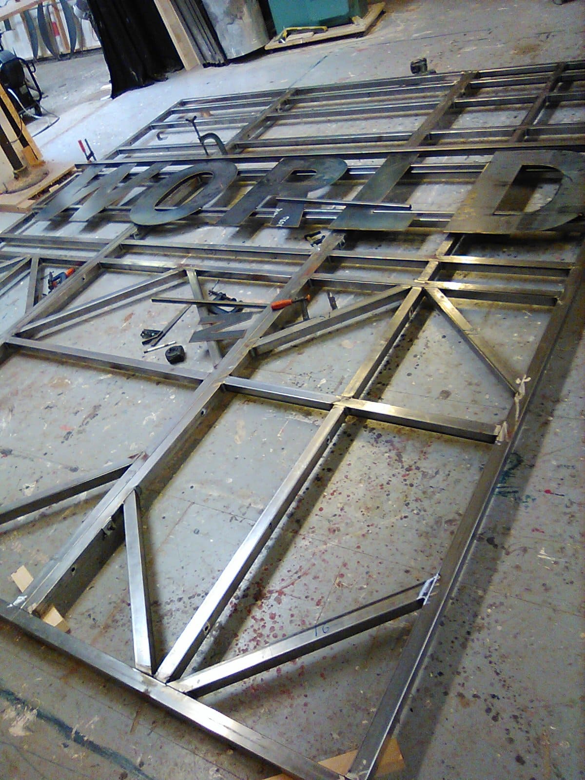 Metal work sign under construction for Vogue World 2023